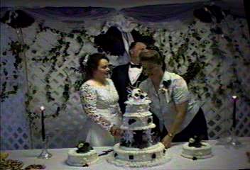 Us cutting the cake........... YUM! 
