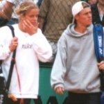 Kim and Lleyton walk onto the court