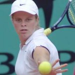 Getting ready to hit a forehand