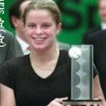 Kim holding her trophy
