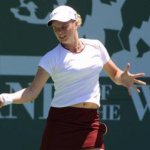 Kim hitting a forehand