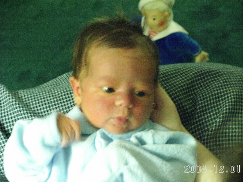 Trey awake and alert in Mom's arms