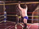 The combatants engage in a test of strength.