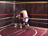 Digger throws Larry from one corner to another.