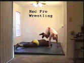 J.P. jumps high into the air to add force to a knee drop.