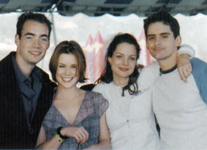 Kim and Brad pose with Kim's siblings Jay and Ashley