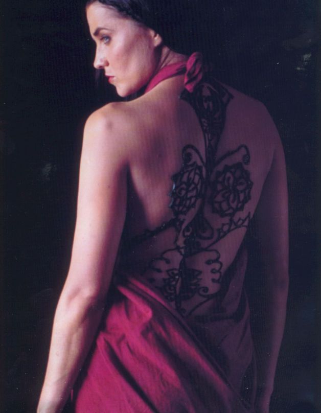 Lucy Lawless as XENA