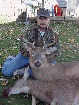 Charlie Reusze with 2004 8 point buck
