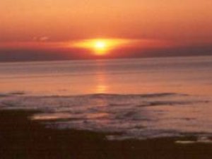 the sunset on brackley beach