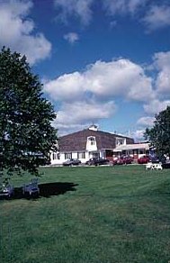 the thriftlodge: look, it has walls, a roof, and some chairs under a tree.