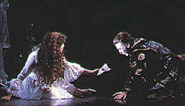 Christine gives mask to Phantom