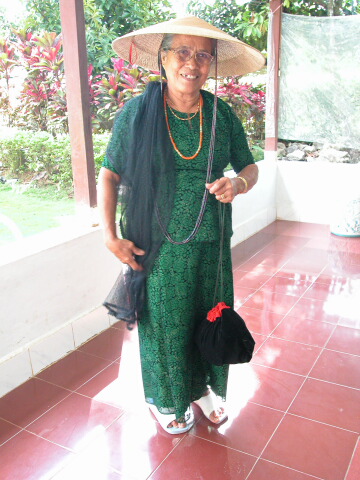 Ms Mache on her way to a funeral ceremony