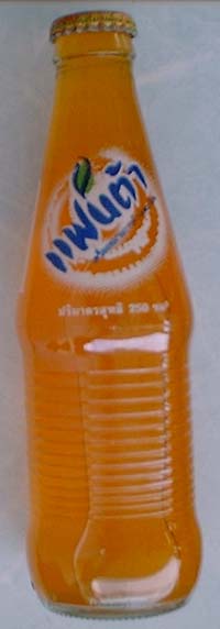 2. 250ml Fanta  Orange Bottle from Thailand. Height of bottle is 7.50 inches and diameter at the base is 2 inches. The wording on one side of the bottle is in Thai and the other side is in English.