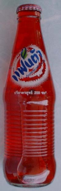 4. 250ml Fanta Strawberry Bottle from Thailand. Height of bottle is 7.50 inches and diameter at the base is 2 inches. The wording on one side of the bottle is in Thai and the other side is in English.