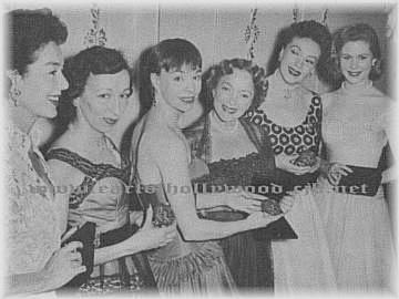 Carol at center with the cropped hair, at the 1955 Tonys, from a Robert Montgomery site. click to visit.