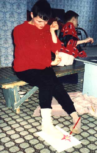 Handicapped painting with foot