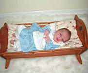 E1-8July29_2004-EmilyDoll-GrandmaMaggiesCradle.jpg