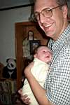 E3-03-20040909-02-EmilySnugglingDaddy.jpg