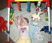 Hpim2073Nov-Em_playing_under_arch-this_end_up.jpg