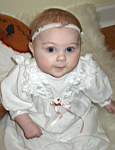 20050206_08w-EmilyGraceHiggins-almost7mo-GrandmaMaggieHigginsdollcradle.jpg