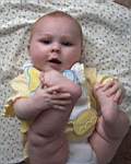 20050223_08w-EmilyHiggins-7mo_playingwithtoes.jpg