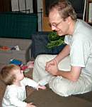 20050305_03b-EmmaleiReynolds-10mo_laughatMatt-Matts36thBday-HigginsMilwaukee.jpg