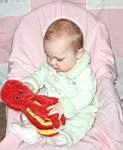20050311_09b-EmilyGraceHiggins-8mo_greenvelvetoutfit_fromGrandmaBrendaHaroldsen.jpg