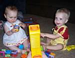 100_0200wl_Emily_Michael_Peek-a-BlocksGiraffe_1stDayHomewMike.jpg