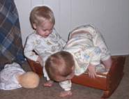 100_0553wl_MikeInCradle_EmClimbingOut.jpg