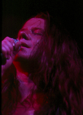  Janis Joplin
upclose and still
pooring her heart out
into her music .. 