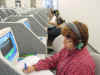An English-as-a-Second-Language student using the new technology.