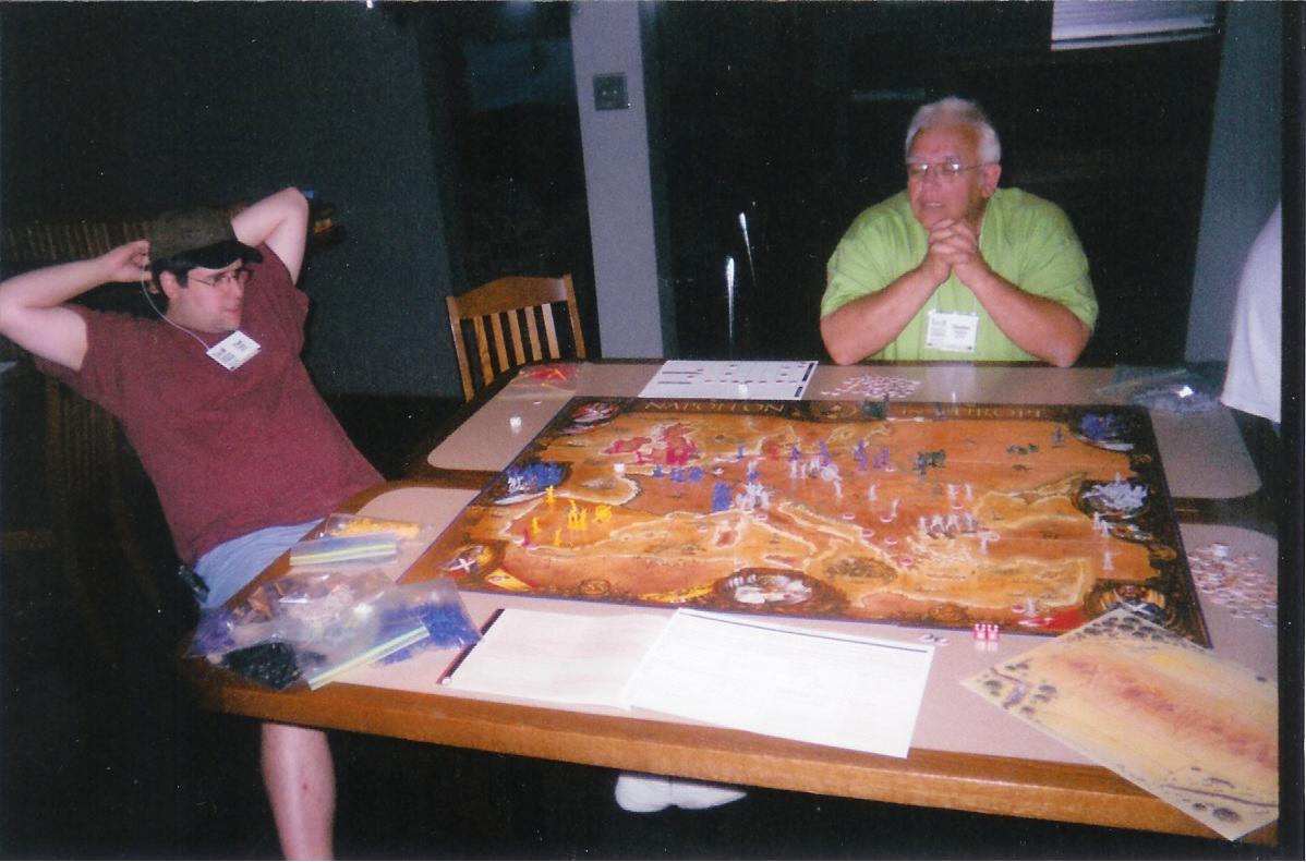 Paul and Chuck playing Napoleon 
In Europe at FlatCon 2004