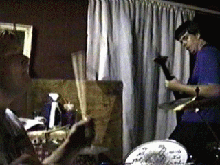My buddy Mike and I moshing it up back in the day