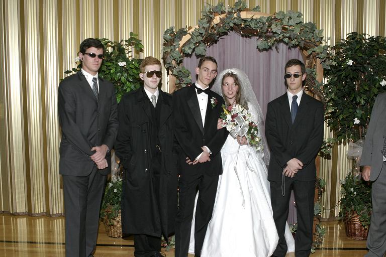 Three men in black suits were there...
