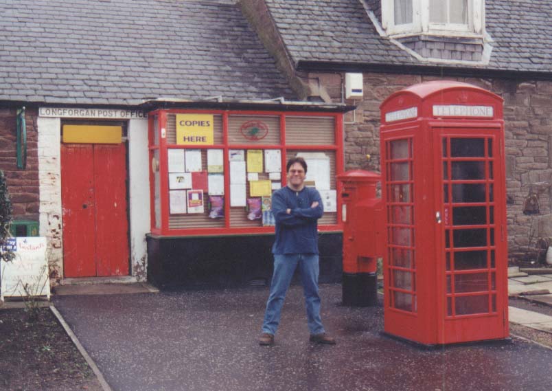 Me by phone box