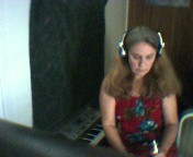 I am under the headphones, listening to something I just recorded.