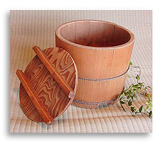A Japanese pickle-barrel with a sigil-like lid, implying that Druidism can cover or preserve items 