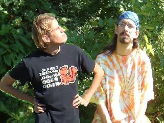 Matt and Sean listening to Messenger outdoors