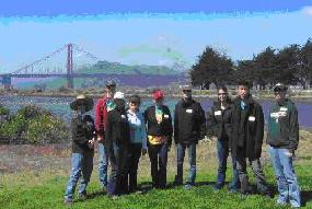 Stacey and her friends at a park doing volunteer work
