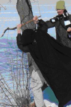  Trying to hack a hole through the ice at the edge of Mai Fete island with a shovel.  