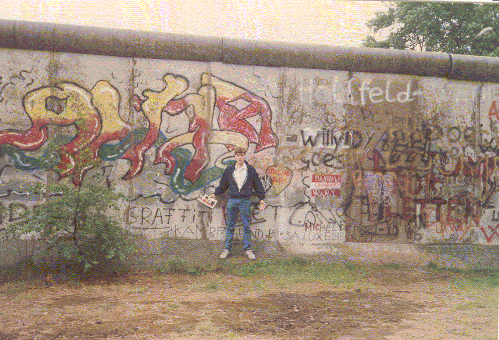 at the wall.
