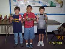 Christian Poche (2nd), Quentin Stevens (1st), Mason Faulk (3rd)