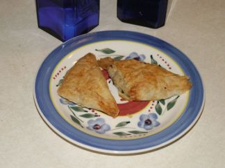 This image is an actual photo of spinach pie pockets we cooked AND ATE!  EXCELLENT too!! LOL