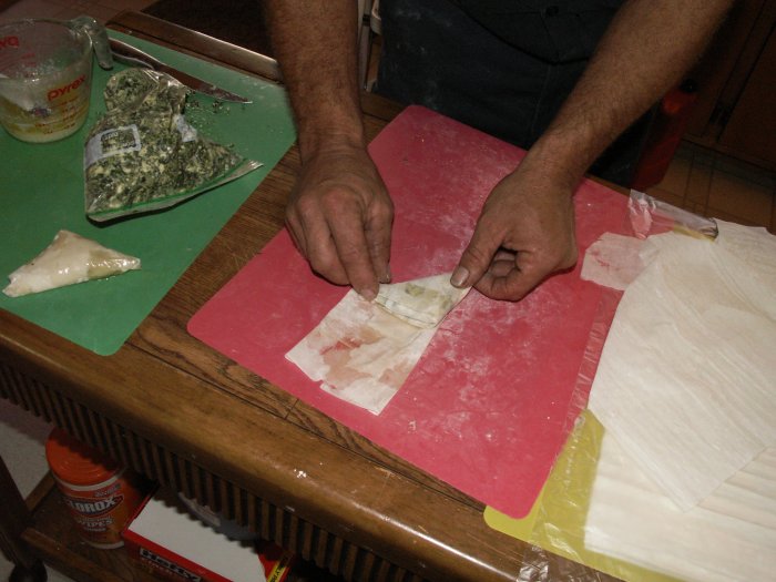 continue making triangle folds until you reach the end of the strip