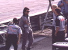 Raul jokes with his crew, Mid-Ohio, 1998