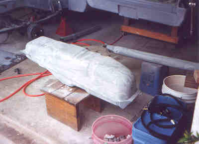 Gas tank and drive shaft