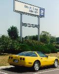 In front of the 'Corvette Plant' Sign