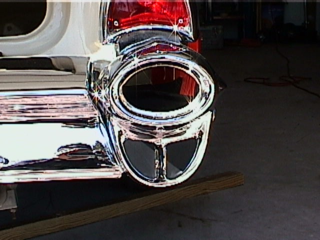 the backlamps are installed in the open area just underneath the taillights