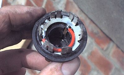 From the vertical brass contact to that electrogalv' spring plate. 