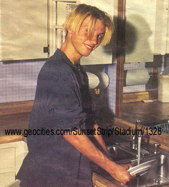 washing dishes! haha, i guess being famous still makes you do chores around the house!
